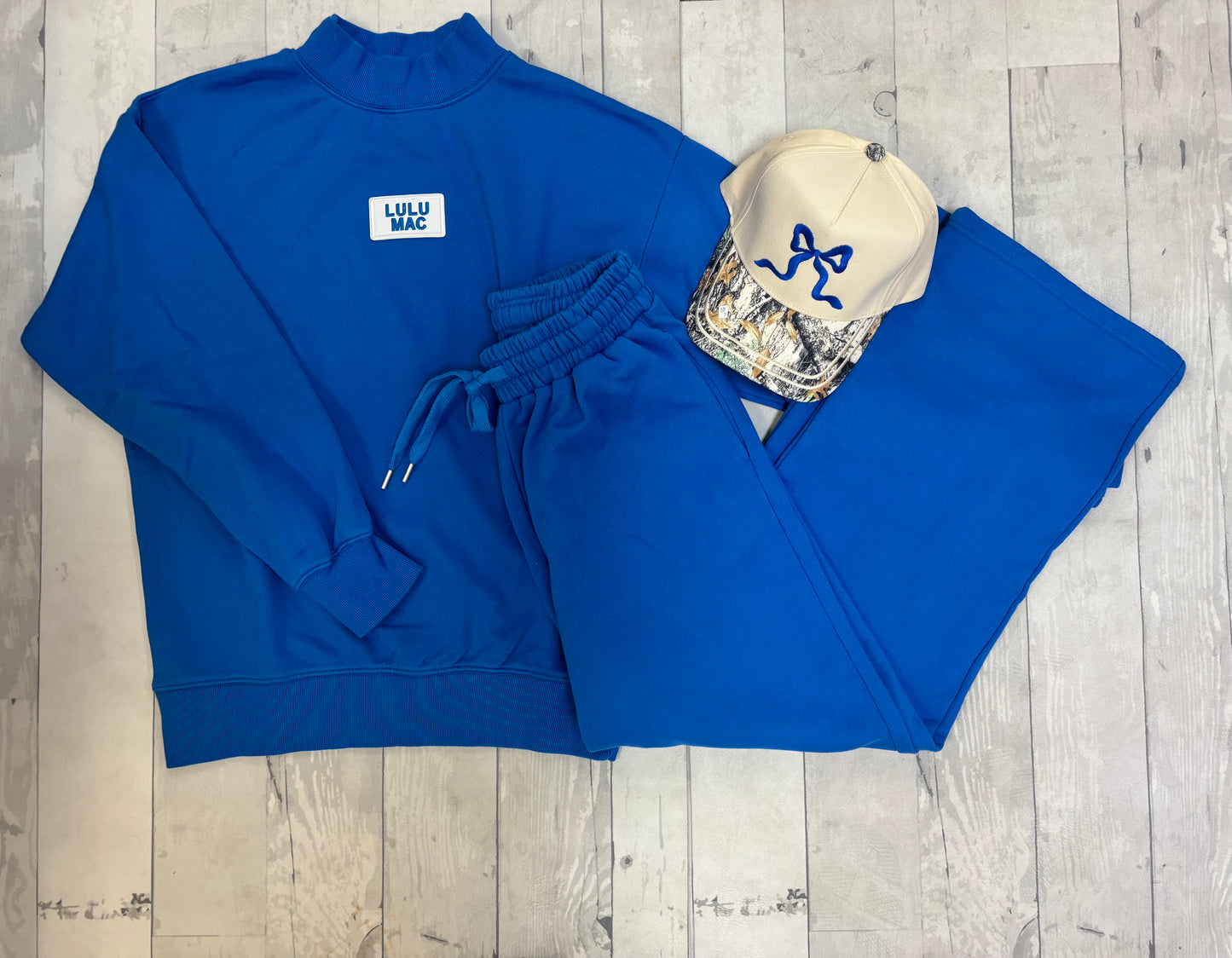 Lulu Mac bright blue mock neck top