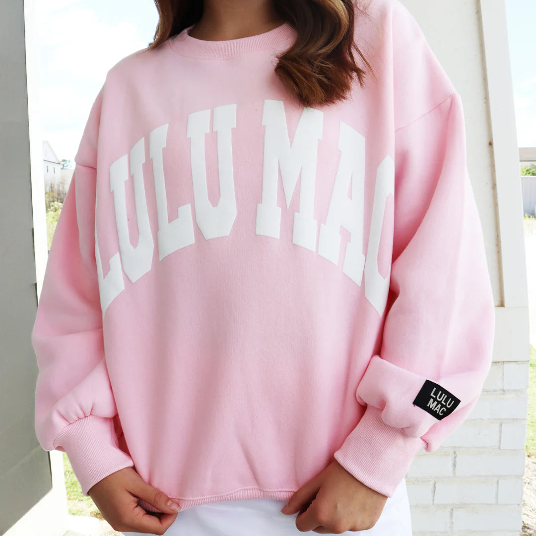 Lulu Mac light pink with white puff