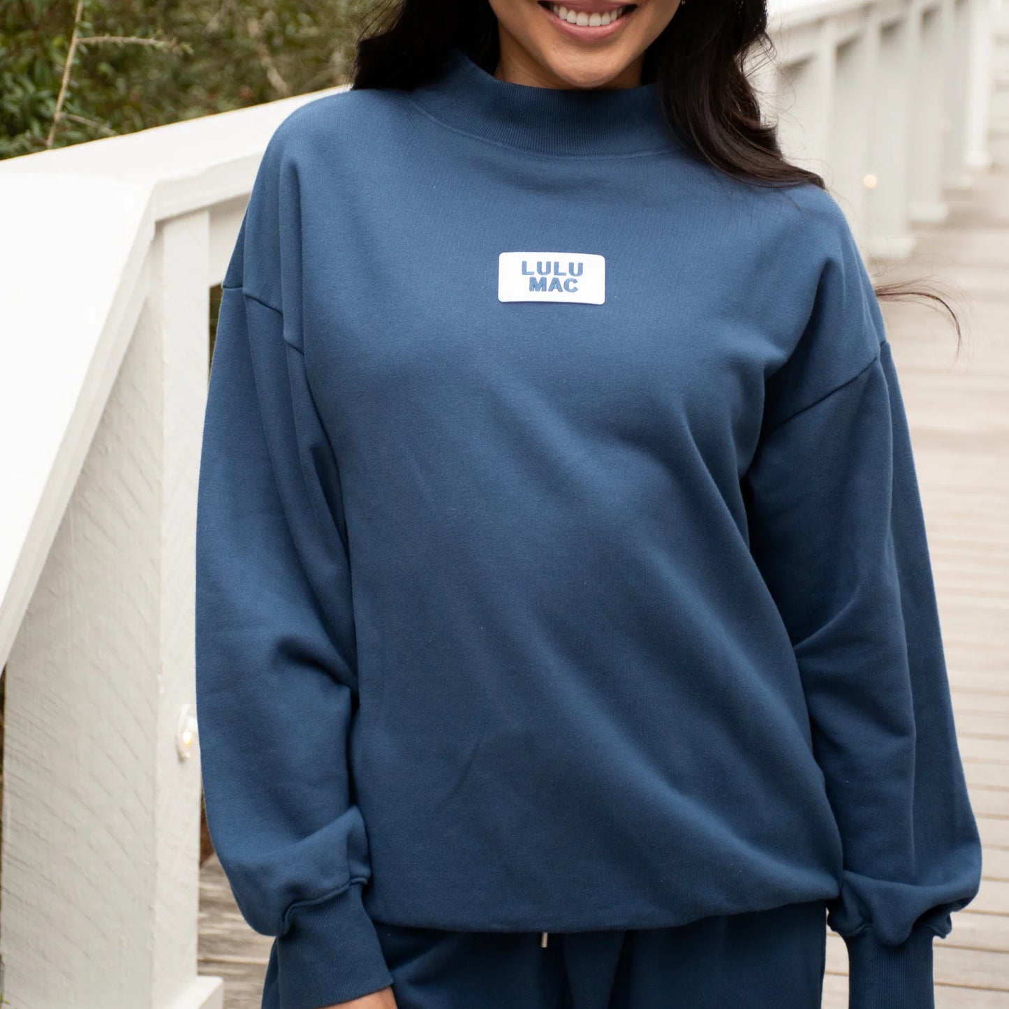 Lulu Mac navy mock neck top